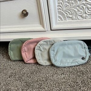 Set of Four Small Pouches in Pastel Colors